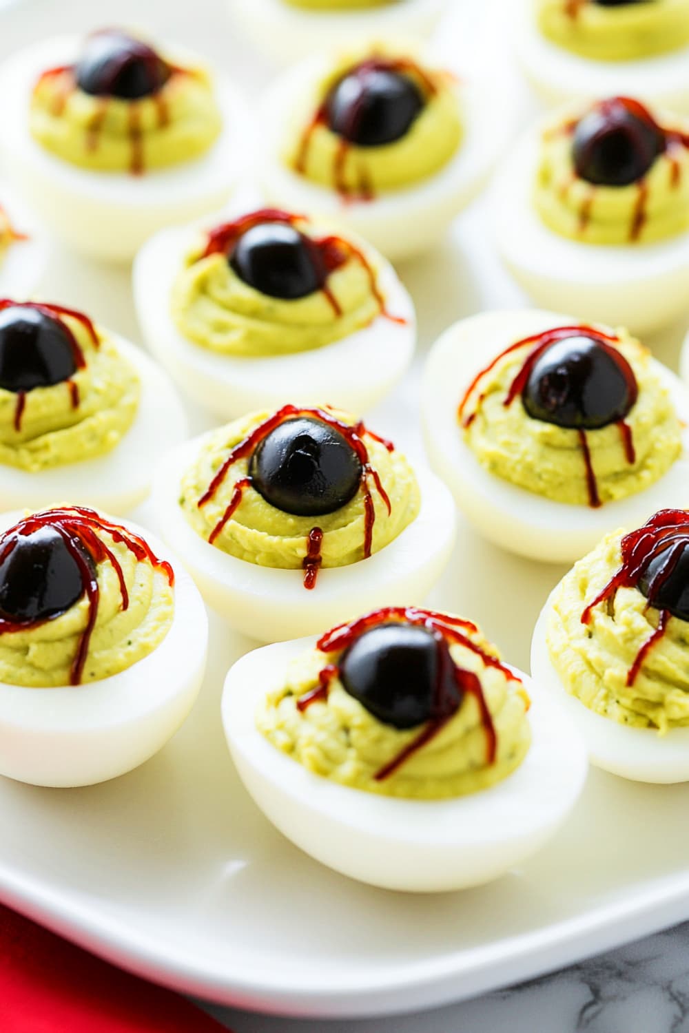 Green Yolked Deviled Egg Eyeballs with Olives