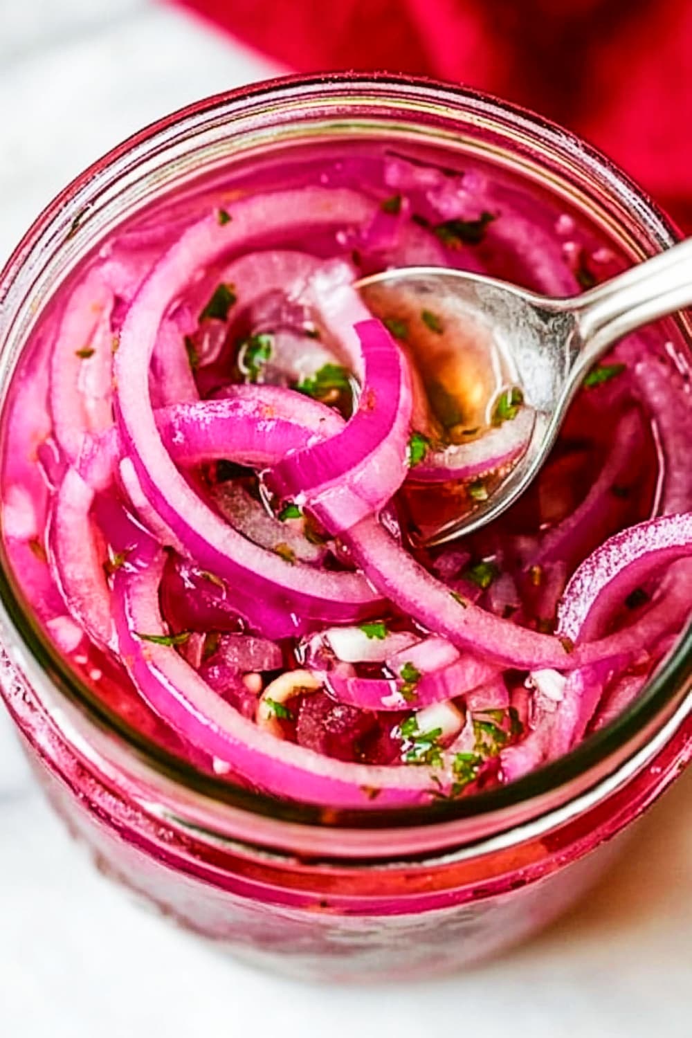 pickled red onion in a jar