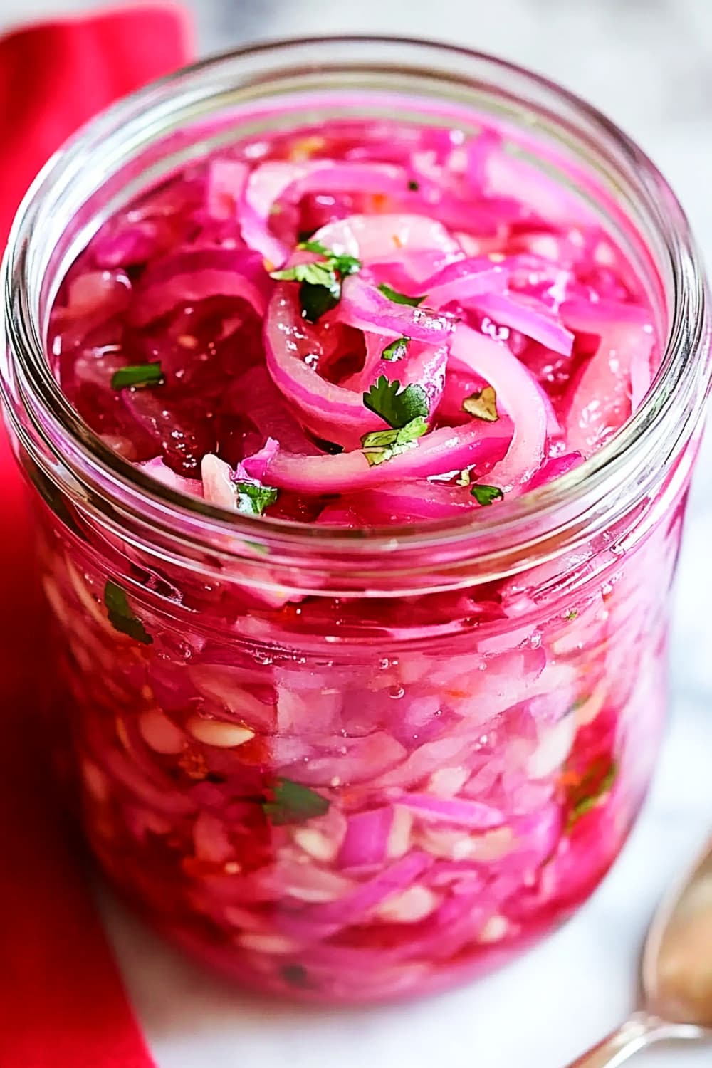 pickled red onion in a jar