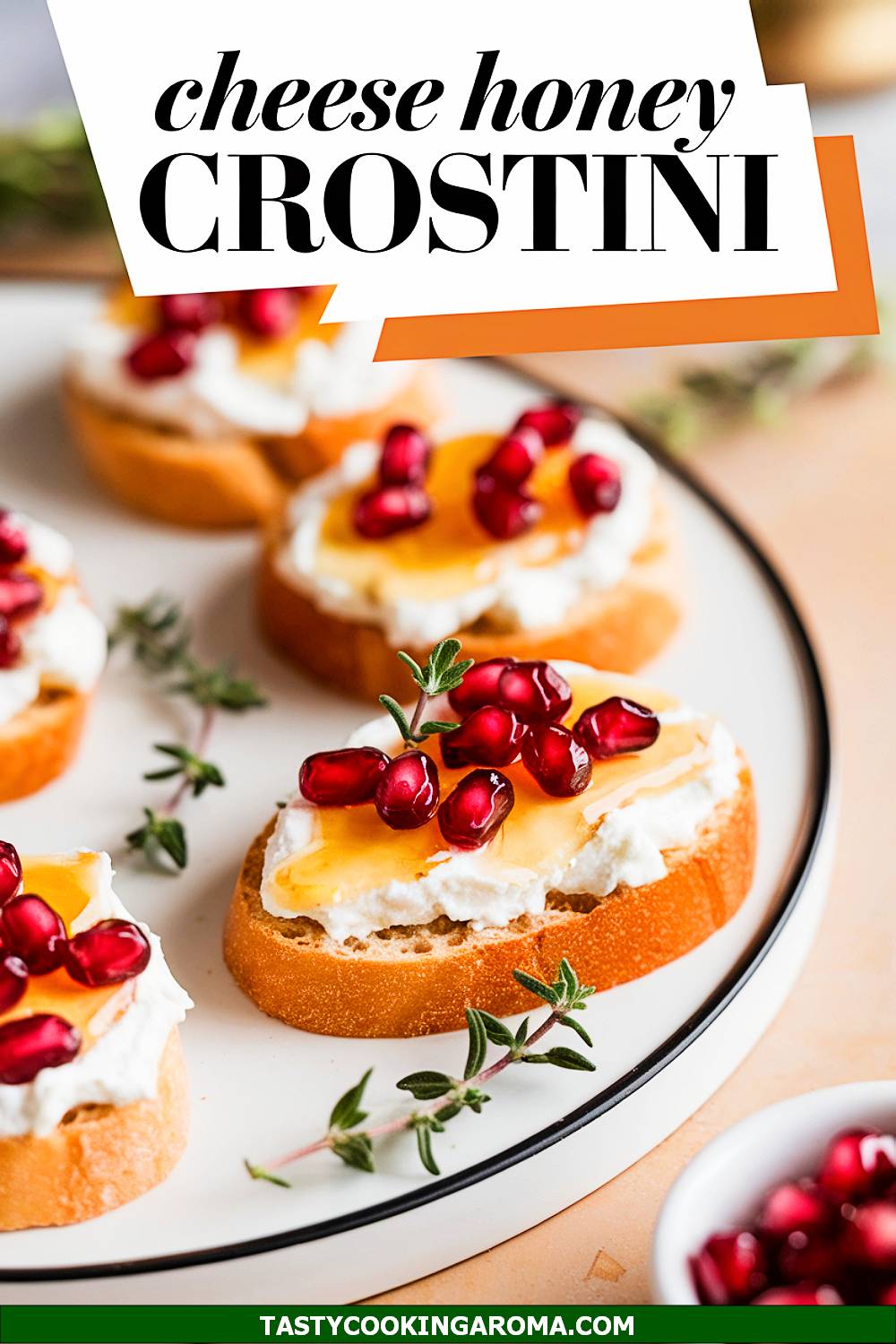 Whipped Goat Cheese and Honey Crostini with Pomegranate Seeds