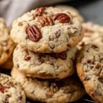 Butter Pecan Cookies with golden edges, toasted pecans on top, and a soft, crumbly texture.